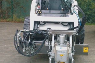Bobcat met planer voor een droge uitvoering